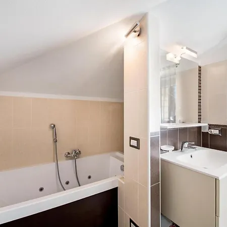 Holiday home Penthouse Colonno